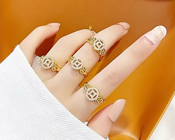 Giải Nghĩa Nhẫn Kim Tiền: Ý Nghĩa Phong Thủy Tài Lộc Và Quy Tắc Đeo Cho Người Mới Tìm Hiểu